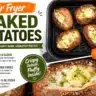 Air fryer baked potatoes cooked to perfection, crispy on the outside and fluffy inside.